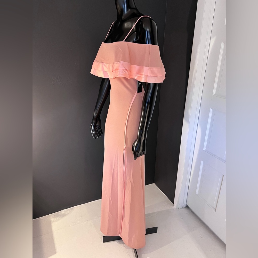 Lulu’s Dusty pink ruffled off the shoulder maxi dress.